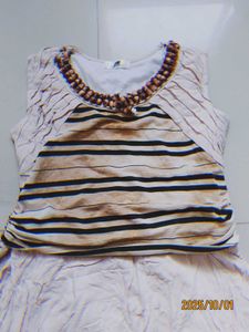 Beaded neckline & flowy bottom