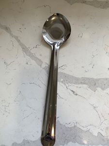 Stainless Steel Laddle Of Big Size.