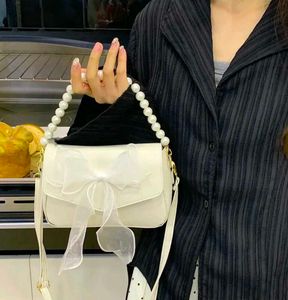 Elegant Bow &amp; Pearl Handbag
