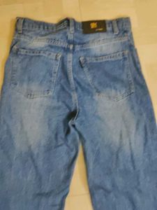 Ripped Light Wash Denim Jeans