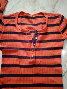 orange pretty top.