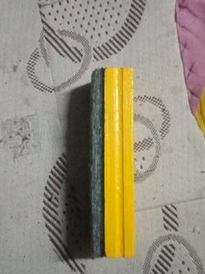 Yellow Wooden Block. Black board duster