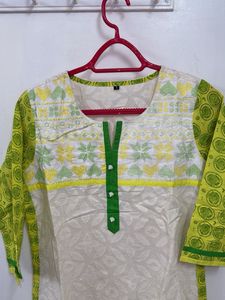 Beautiful White Kurti With Green Embroidery