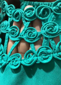 It Is A Teal Green Coloured Top Of Free Size.