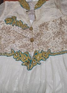 Beautiful Off White Gown With Two Tone Net Fabric