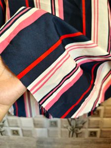 Striped Dress Defect: Bottom needs to be stiched