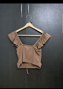 Brown ruffle top