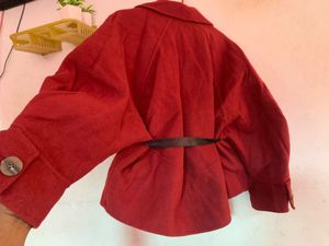 Red belted coat