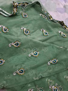 Heavy Party Wear With Stone Work Green Net Saree