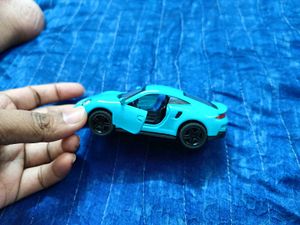 Teal Porsche Toy Car