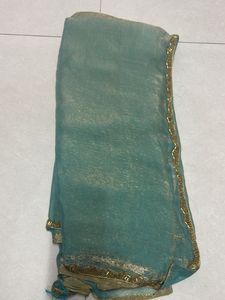 Elegant Teal Saree with Gold Details