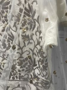 cream full hand work Chaniya choli wid net dupatta