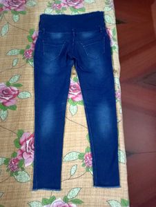Dark Blue Jeans With Cut On Left Leg..