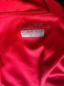 Show your Reds pride with the official Reebok