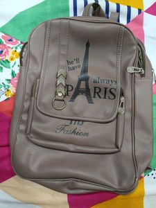 Slightly Used Bagpack With 4 Chain Pockets