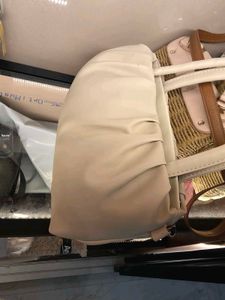 Off white Sling Handbag