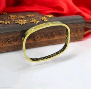 Gold-Tone Bangle with Accents