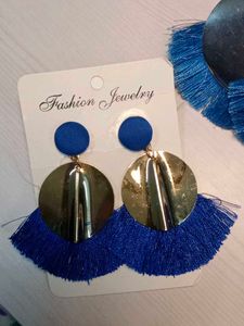 circular disc, stud, and a tasse