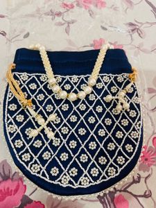 Elegant Heavy Blue Pearl Potli Bag with Tassels