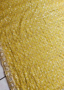 Golden Embellished saree with blouse piece