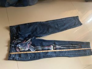 skeleton graphic jeans