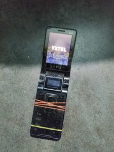YXTEL flip phone