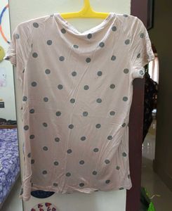 Nude color tshirt with sliver patch work.
