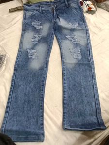 Ripped Blue Denim Jeans