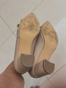 Elegant Nude Heels with Bow Detail