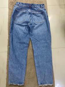 Ripped Knee Denim Jeans