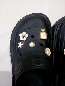 Platform Crocs with charms