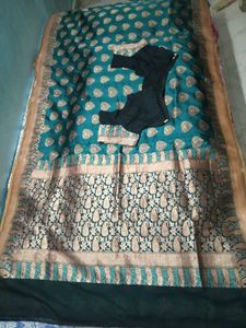 Embellished Banarasi Saree With Patterned Blouse.