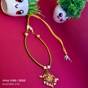 Elegant Gold-Toned Necklace with Pearl Accents