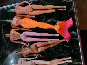 Lot of 8 Barbie Dolls