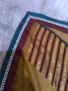 Elegant Gold gliter Saree with stones