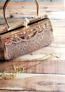 Embellished Clutch With Multiple Zircon Chain