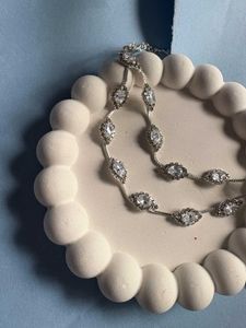Elegant Silver Necklace With Matching Earrings