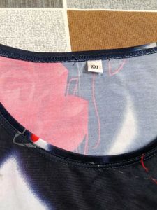 smart black top with red flowers on it