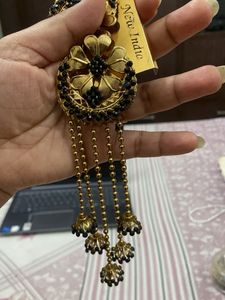 Golden black ear rings