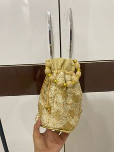 Elegant Gold Embroidered Potli Bag