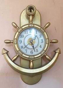 present analog wall clock with glass pendulum