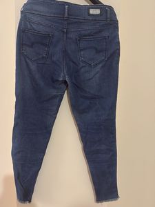 Ripped Blue Denim Jeans