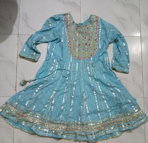 kurta (top), palazzo pants, and a dupatta (scarf).