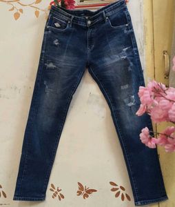 Distressed Dark Wash Denim Jeans