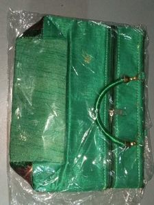 Elegant Maroon Clutch with Peacock Design