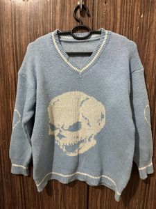 A Blue Skull Sweater.