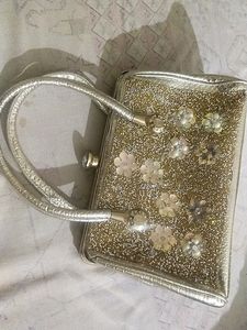Heavy purse For Women With Beautiful Stone Work.