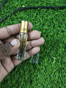 Two Decorative Perfume Bottles ( name of attar Sha