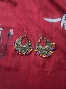 7 sets of jhumkas, ₹50 each, All buy get 1 free.