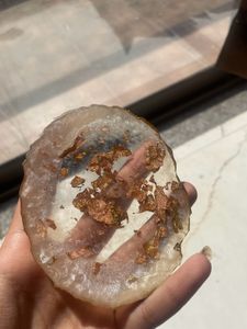 resin coaster with gold flakes in it